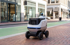 A sidewalk delivery robot. Agentic AI can combine perception, SLAM, reasoning, and planning in dynamic environments.