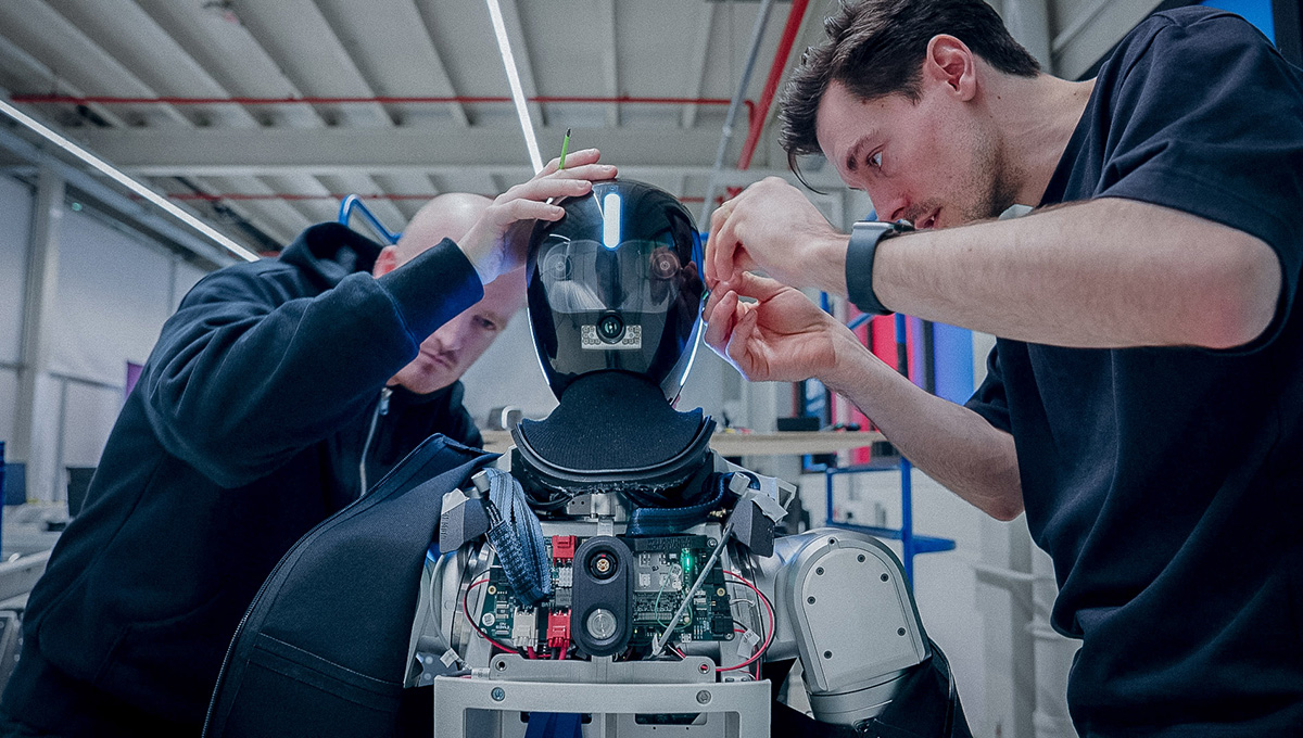 Humanoid and Bosch technicians work on HMND 01.