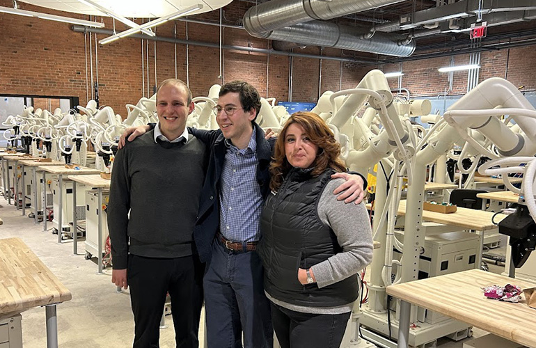 Tutor Intelligence CTO Alon Kosowsky and CEO Josh Gruenstein with Alla Simoneau, physical AI technology at the AWS Generative AI Innovation Center, at Tutor's Digital Factory. 