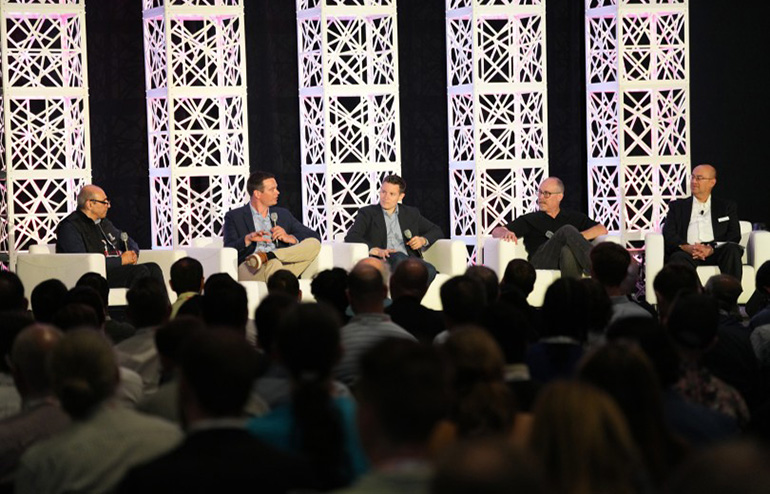 In the Robotics Summit opening keynote, QNX President John Wall, second from right, joined (from left) Locus Robotics' Hamid Montazeri, Universal Robots' Anders Beck, Amazon Robotics' Aaron Parness, and moderator Eugene Demaitre. 