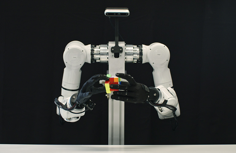 Genesis AI's foundation model enables a robot to solve a Rubik's Cube.