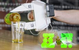 UMI gripper equipped with uSkin sensors in the fingertips, with real-time tactile data visualization.