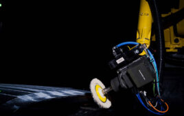 A GrayMatter Robotics robot buffing a part.