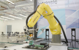 Hero image of the intrinsic workcell featuring a FANUC robot.