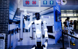 The AGIBOT G2 wheeled robot provided subway guidance at WAIC 2026.
