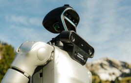 A Flexion humanoid robot, trained in part with teleoperation. full autonomy stack includes a command layer, a motion layer, and a control layer.