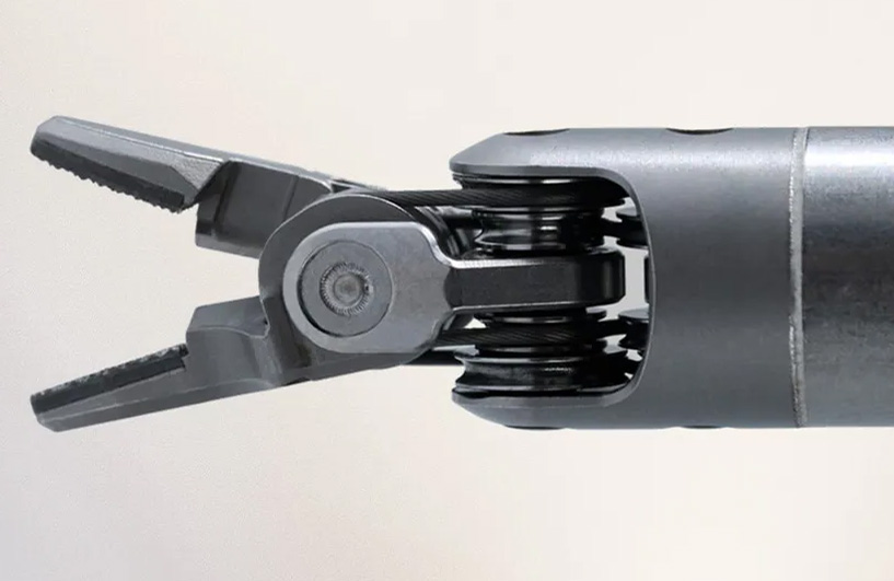 The Ottava surgical robot's two-in-one needle driver instrument.