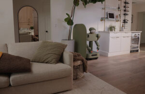 the weave issac-1 robot at rest in a living room scene.