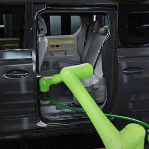 a robot arm vacuums the interior of a robotaxi.