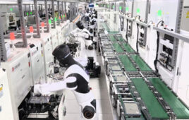 AGIBOT's semi-humanoid robot working in a pilot at Longcheer Technology's Nanchang factory.