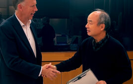 Mel Torrie, CEO of ASI shakes hands of SoftBank leadership.