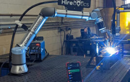 With the company's new linear rail, Hirebotics cobots, like ones used for welding above, can extend beyond its 68.9-inch reach.