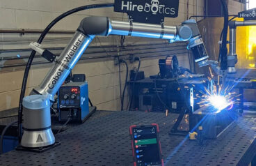With the company's new linear rail, Hirebotics cobots, like ones used for welding above, can extend beyond its 68.9-inch reach.