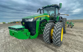 Hero image of a John Deere 8R tractor