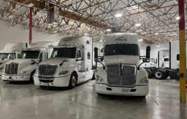 PlusAI autonomous trucks at its testing facility in Fremont, Calif.