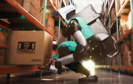 Agility Robotics' Digit 5 humanoid robot at work in a warehouse.