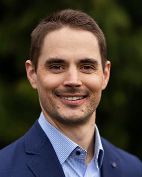 headshot of Ben Waters.