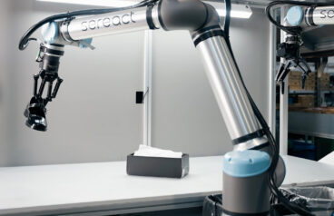 At Zalando's fulfillment centers in Germany and Poland, Sereact and Universal Robots now autonomously process returned fashion items, in this case the robot is picking a black women's shoe.