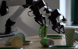 Two robot arms cleaning a table. One holds an empty can.