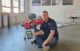 Nicolas Sauvage, the founder and president of TDK Ventures, with ANYbotics' quadruped robot.