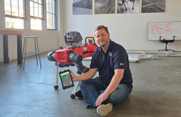 Nicolas Sauvage, the founder and president of TDK Ventures, with ANYbotics' quadruped robot.